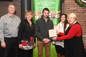 The owners of Par Chier Farms receive the Premier's Award for Agri-Food Innovation from Deputy Premier Deb Matthews